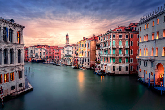 A dreamy image of the Grand Canal from the Rialto Bridge taken at sunrise